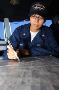 Why Your Position Is More Than Two Numbers A U.S. Navy signalman plotting a vessel position on a navigation chart